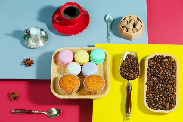 Coffee with dessert on a bright colored  - 写真・画像