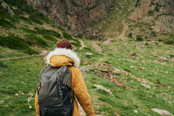 woman hiker with backpack mountains travel adventure freedom - 写真・画像