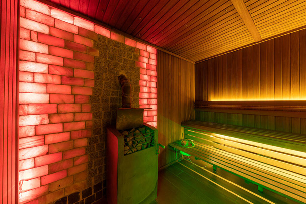 sauna interior with atmospheric multi-colored lighting - Foto, imagen