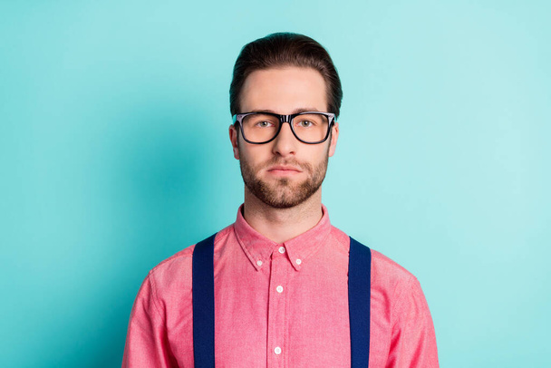 Photo of serious charming young man wear glasses serious face gentleman isolated on teal color background - Фото, зображення