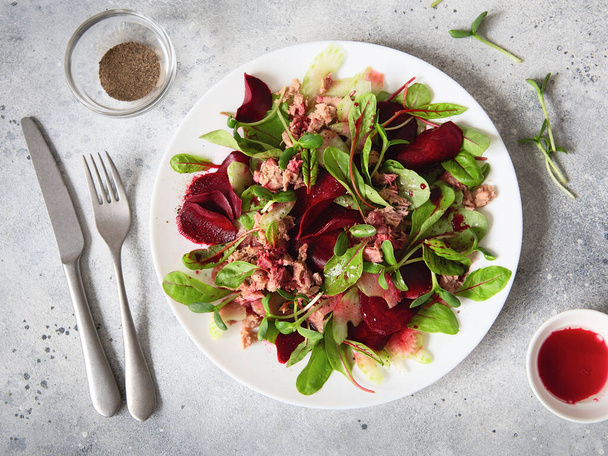 Healthy fresh salad. Beetroot, red chard and canned tuna salad. Healthy Meal recipe preparation. Plant-based dishes. Green living. Vegetarian recipes. Food styling. Organic food. Vegetarian cuisine - Photo, Image