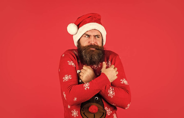 Cold weather. Holiday season mood. Bearded man santa hat. Merry christmas. Xmas party. Christmas celebration. Happy new year. Hipster funny knitted sweater. Christmas sale. Winter is snow much fun - Photo, image