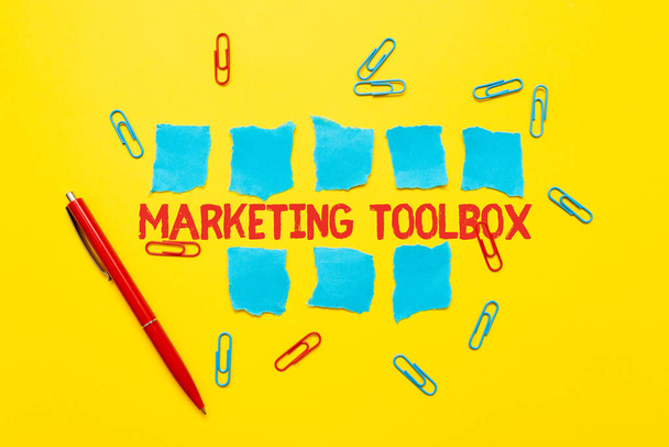 Sign displaying Marketing Toolbox. Business idea Means in promoting a product or services Automation Critical Thinking Finding Clues Answering Questions Collecting Data - Photo, Image