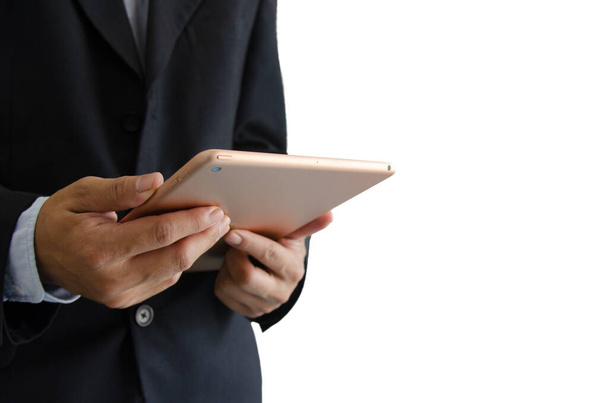 businessman holding a tablet. Digital technology.Copy space - Zdjęcie, obraz