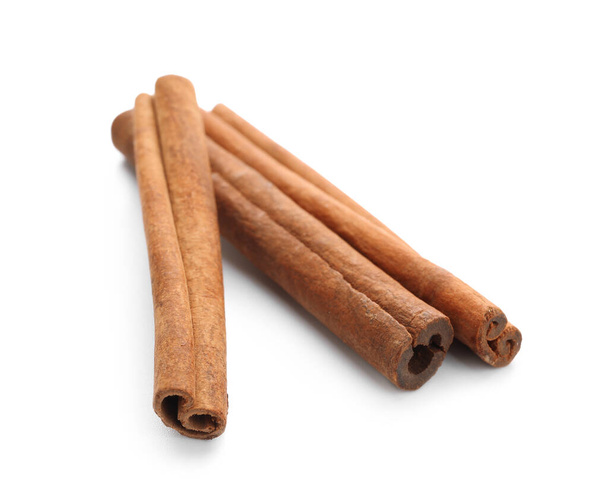 Natural cinnamon sticks on white background - Photo, Image