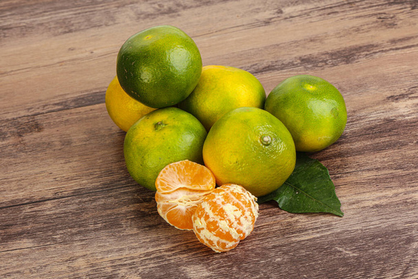 Sweet ripe and tasty green mandarin heap - Photo, Image