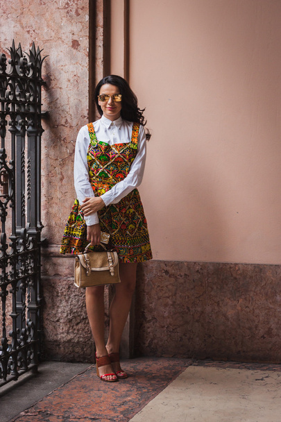 Woman posing outside Byblos fashion shows building for Milan Women's Fashion Week 2014 - Zdjęcie, obraz