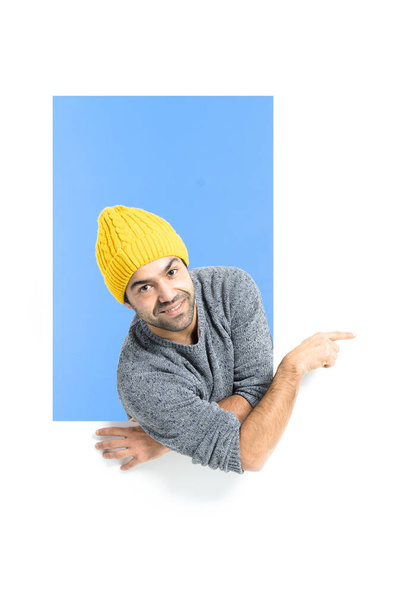 Hispanic hipster pointing to white copy space - Photo, Image