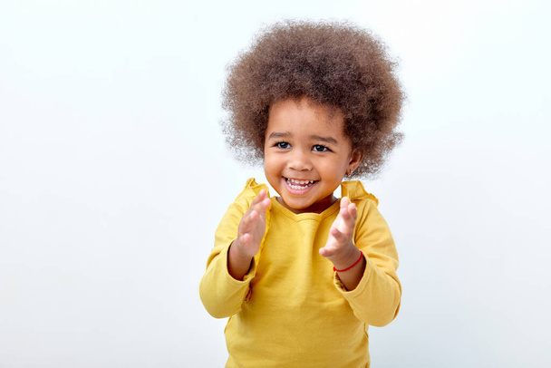 Excited black child girl clapping and applauding, happy and joyful, smiling - Zdjęcie, obraz