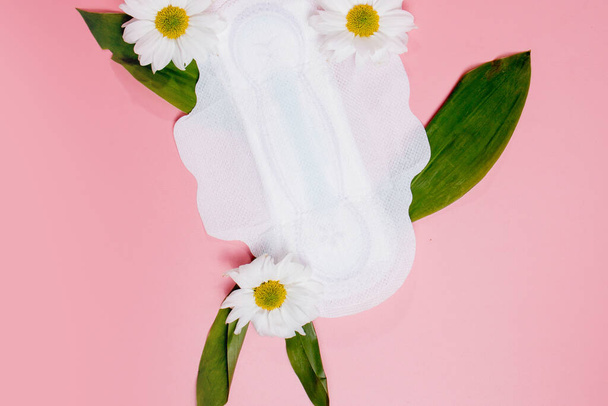 Floral clean sanitary pad, hygiene concept, women products, menstrual pads. - Φωτογραφία, εικόνα