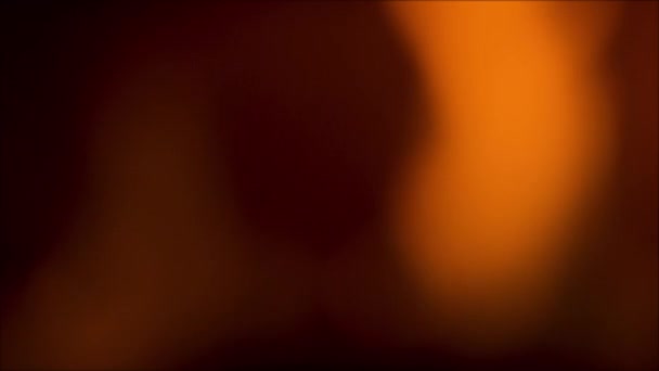 Μαλακό αφηρημένο χρυσό πορτοκαλί φως θολή - Πλάνα, βίντεο