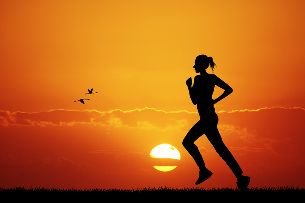 Girl running at sunset - Foto, Imagem