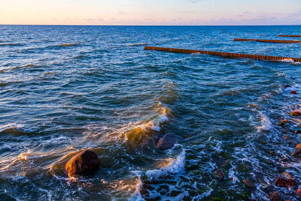 Sea landscape. Surfline with waves and foam. Nature background - Zdjęcie, obraz