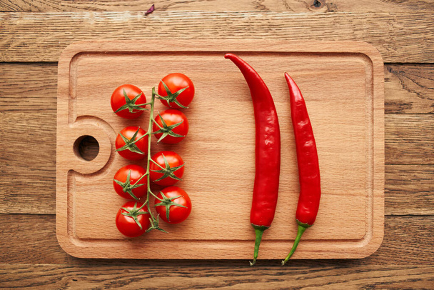 cherry tomatoes hot peppers salad ingredients fresh food - Фото, зображення