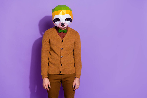 Photo of young man weird incognito annoyed bored tired failure isolated over violet color background - Foto, imagen