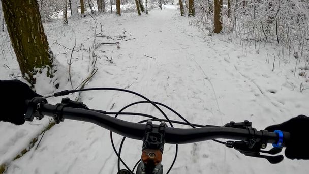 Amateur enduro rider on the bicycle in the winter season - Photo, Image