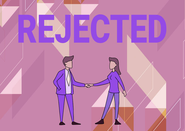 Hand writing sign Rejected. Business approach dismiss as inadequate unacceptable or faulty refuse to agree Man And Woman Standing Facing Towards Each Other Holding Hands. - Photo, Image