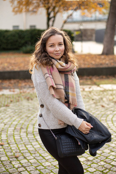 European white young woman with brown hair walking in autumn - Foto, Imagem