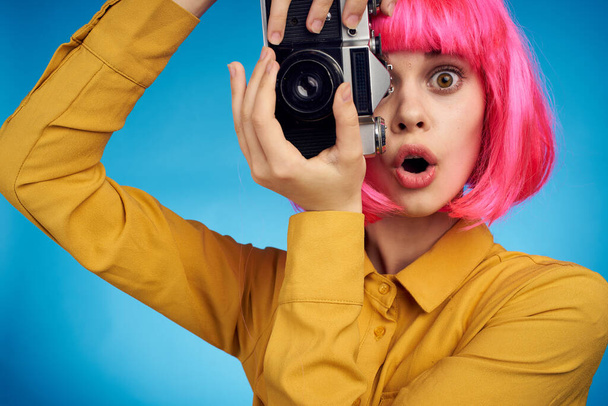 pretty woman with pink hair photographer with camera creative profession - Photo, Image