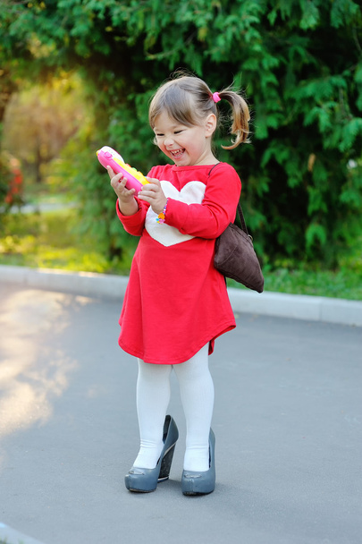 little girl speaks by phone - Photo, Image