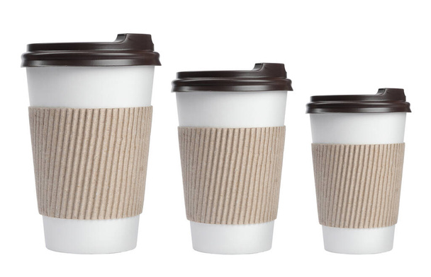 Paper coffee cups of different sizes on white background, collage - 写真・画像
