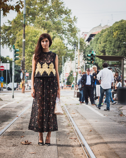 Woman posing outside Gucci fashion shows building for Milan Women's Fashion Week 2014 - Photo, Image