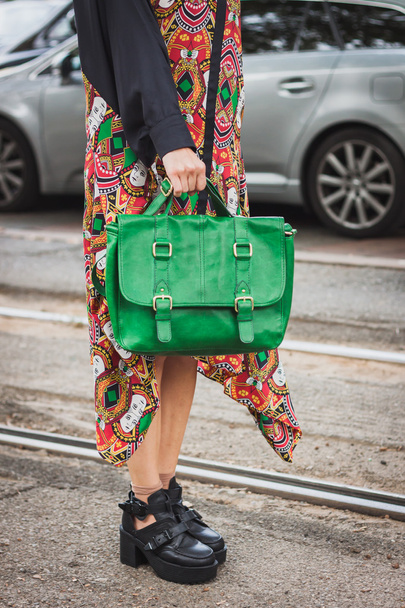 Detail of bag and shoes outside Gucci fashion shows building for Milan Women's Fashion Week 2014 - Photo, Image