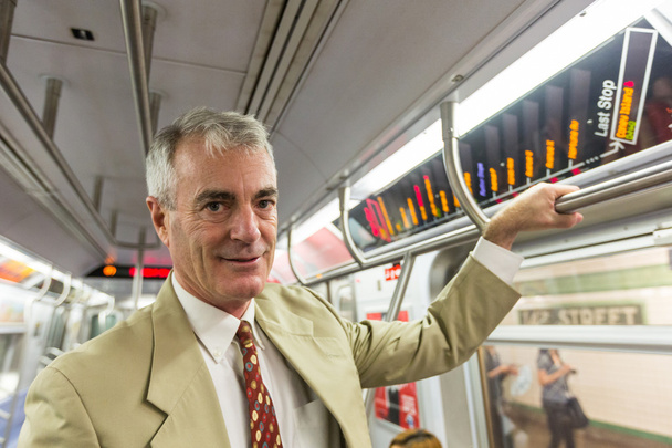 Senior Businessman in the Subway Train - Photo, Image
