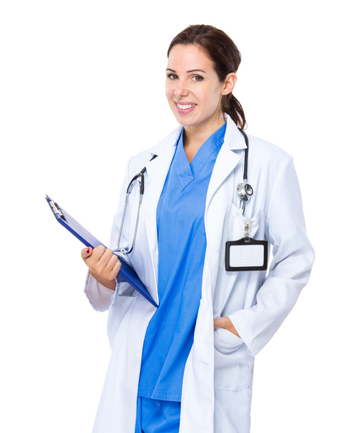 Female doctor with folder - Фото, зображення