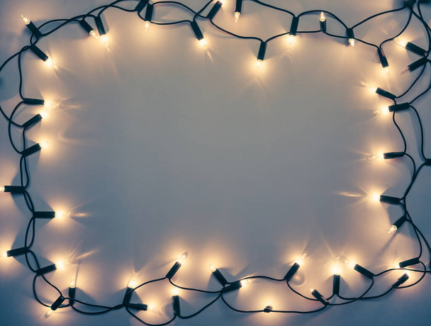 Vintage Navidad luces marco tonificado fondo - Foto, Imagen