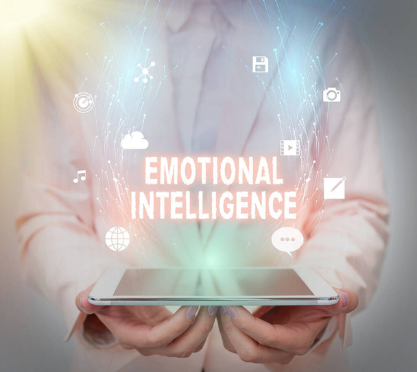 Sign displaying Emotional Intelligence. Conceptual photo Self and Social Awareness Handle relationships well Business Woman Using Phone While Presenting New Futuristic Virtual Display. - Photo, Image