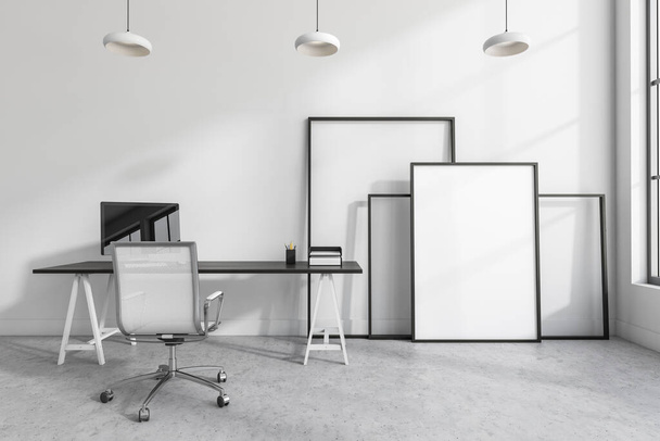 Light office room interior with white armchair and computer on table, window. Mockup blank canvas frame on grey concrete floor, 3D rendering - Photo, Image