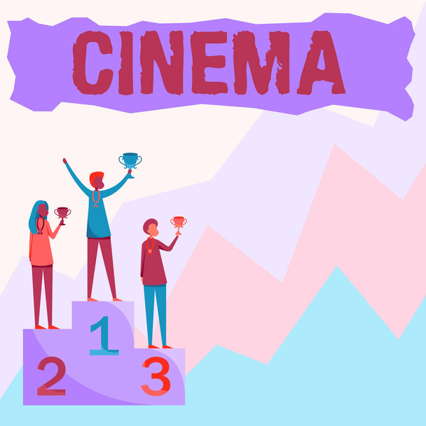 Inspiration showing sign Cinema. Business approach theater where movies are shown for public entertainment Movie theater Three Competitors Standing On Podium Holding Trophies Celebrating Victory. - Photo, Image
