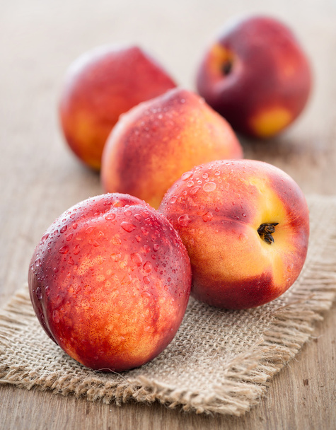 Juicy fresh peaches on  wooden background - Zdjęcie, obraz