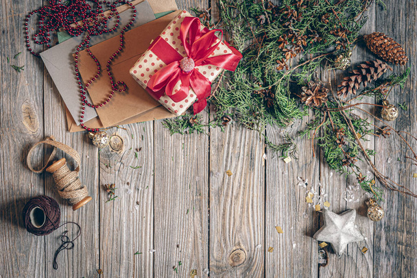 Christmas flat lay background on wooden surface. - Foto, afbeelding