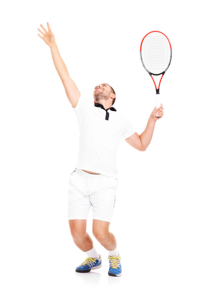 Joueur de tennis servant une balle
 - Photo, image
