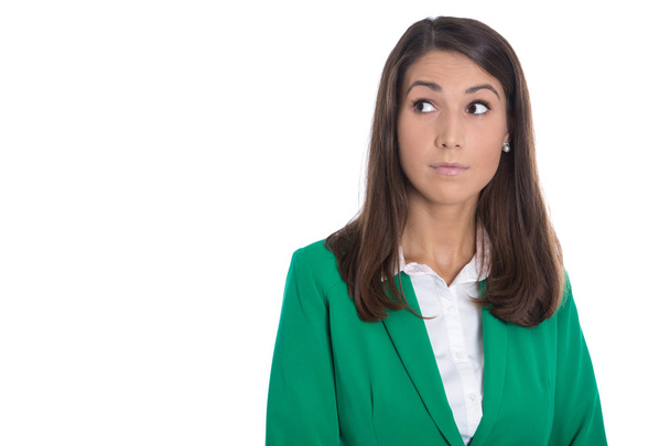Isolated business woman in green looking doubtful sideways to te - Foto, immagini