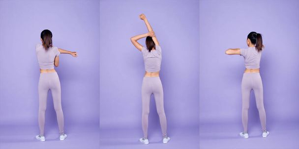 フル長アジアのスリムフィットネス女性は、ストレッチ春のジャンプ足を暖め運動,スタジオ照明紫色の背景コピースペース,コンセプト女性は非常にペリカラーブロックムードトーンで選手を行うことができます - 写真・画像