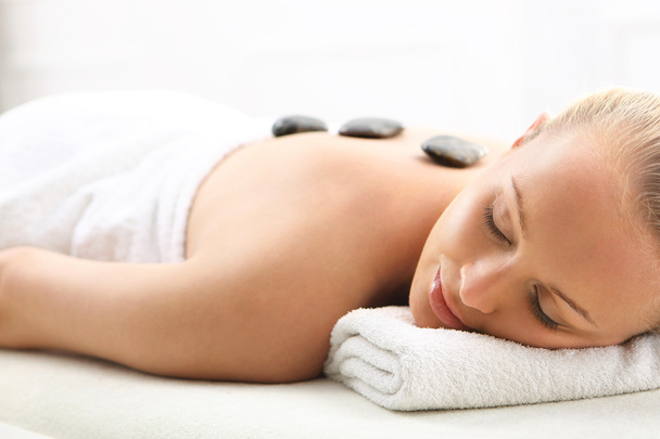 Hot stone massage, Swedish massage - Foto, Imagen