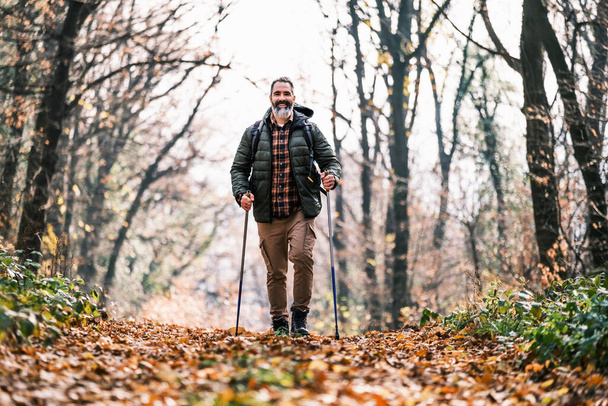 Image of man enjoys hiking in  nature. - Fotografie, Obrázek