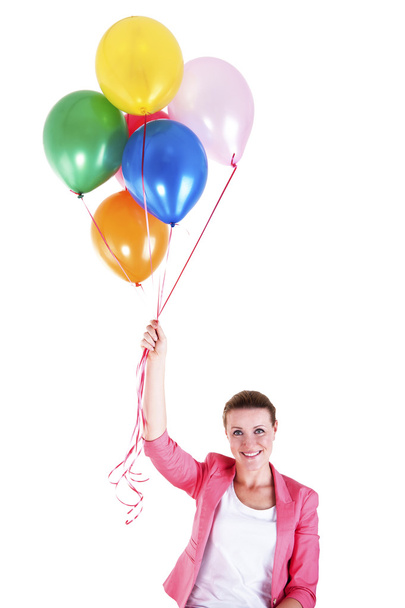 Жінка з повітряними кулями на білому тлі посміхається
 - Фото, зображення