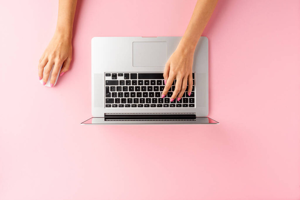 Woman hands working on laptop. Business background. Top view - Zdjęcie, obraz