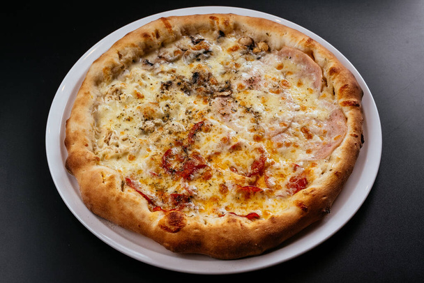 freshly made pizza close up - Фото, изображение