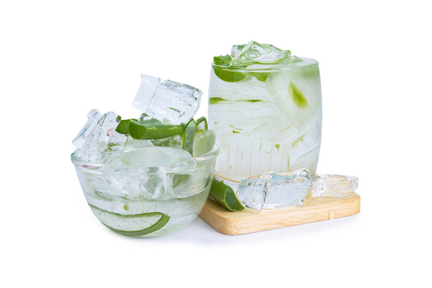 Aloe vera slices in glass for a drink with isolated white background - Foto, Bild