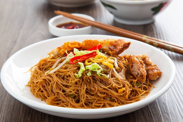 Stir-fried Chinese economic rice noodles. Famous food of Malaysian breakfast - Photo, Image