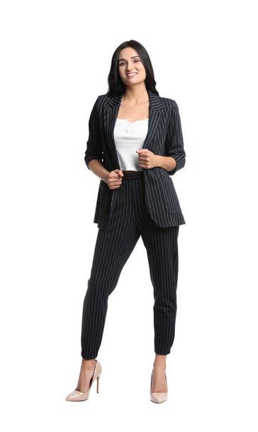 Full length portrait of beautiful woman in formal suit on white background. Business attire - Foto, imagen
