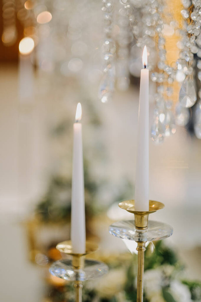 a Closeup of decoration of candles and bokeh lights on the background - Photo, Image