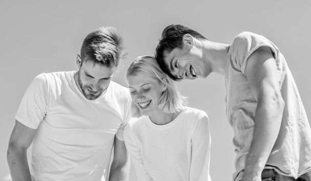 group of people look down. heaven concept. look from success heights. happy woman and two men. cheerful friends. friendship relations. family bonding and love. just look at that - 写真・画像