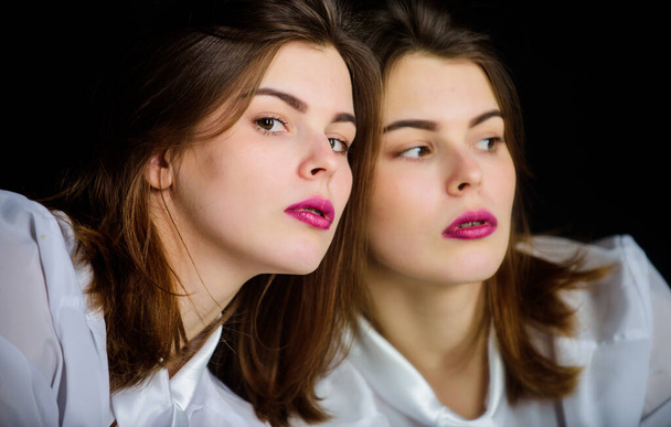 Makeup artist. Daily style makeup. Pretty lady. Femininity. Reflexion girl looking in mirror. Appearance concept. Beauty treatment and skin care concept. Woman makeup face pink lips. Beauty salon - 写真・画像