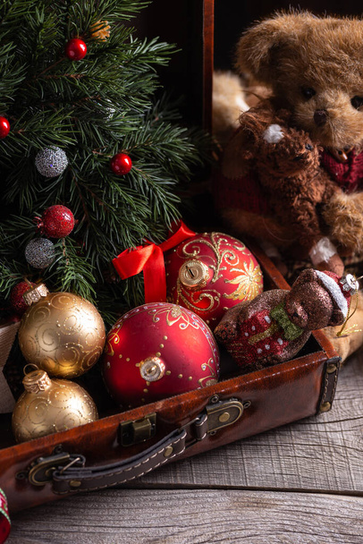 Old suitcase with christmas toys - 写真・画像